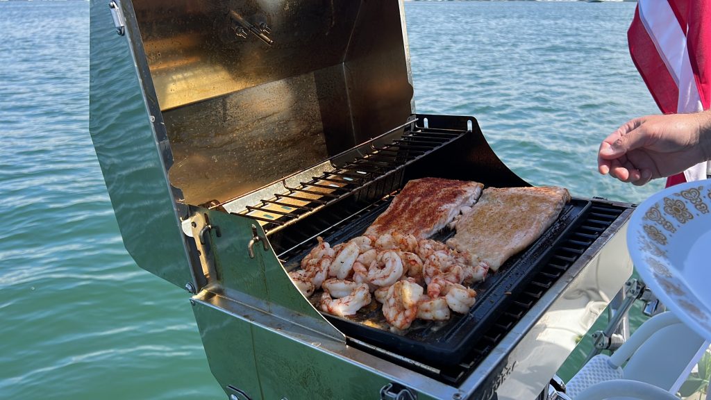 Grilling on the back of a boat